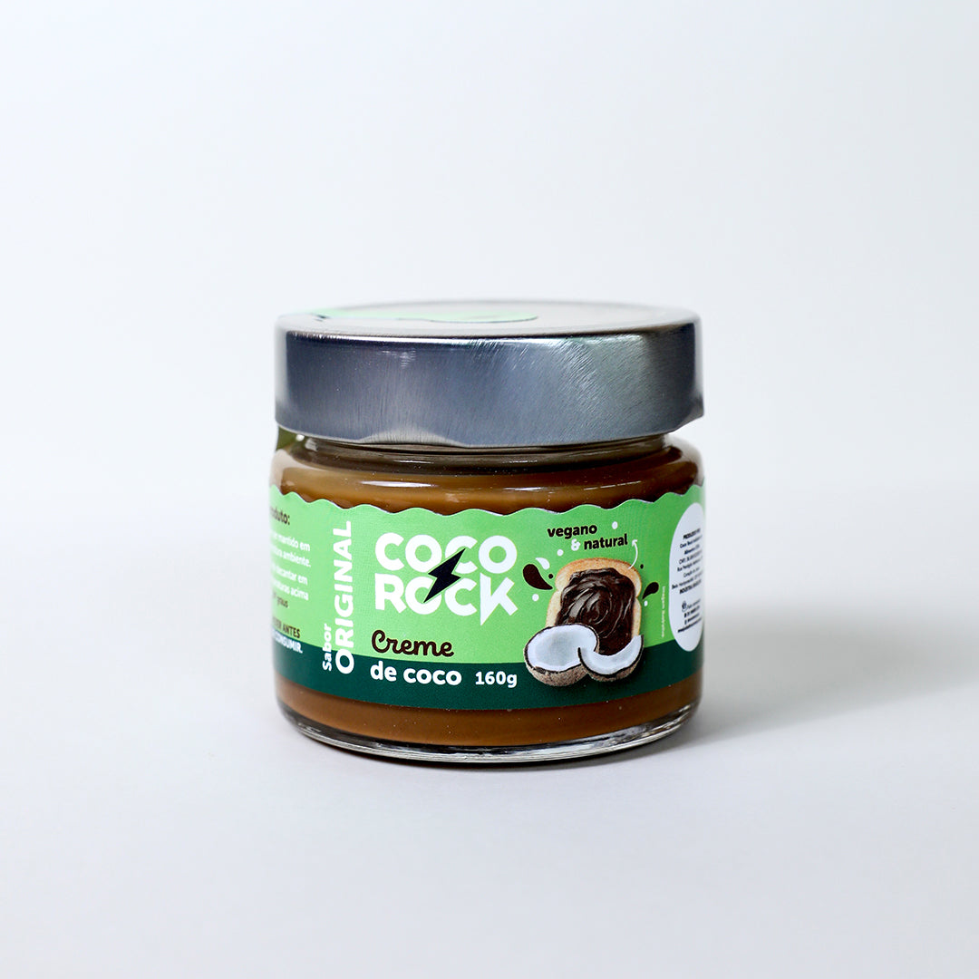 Creme de coco original em embalagem de 160g, com uma fatia de pão com creme em cima e dois pedaços de coco no rótulo.